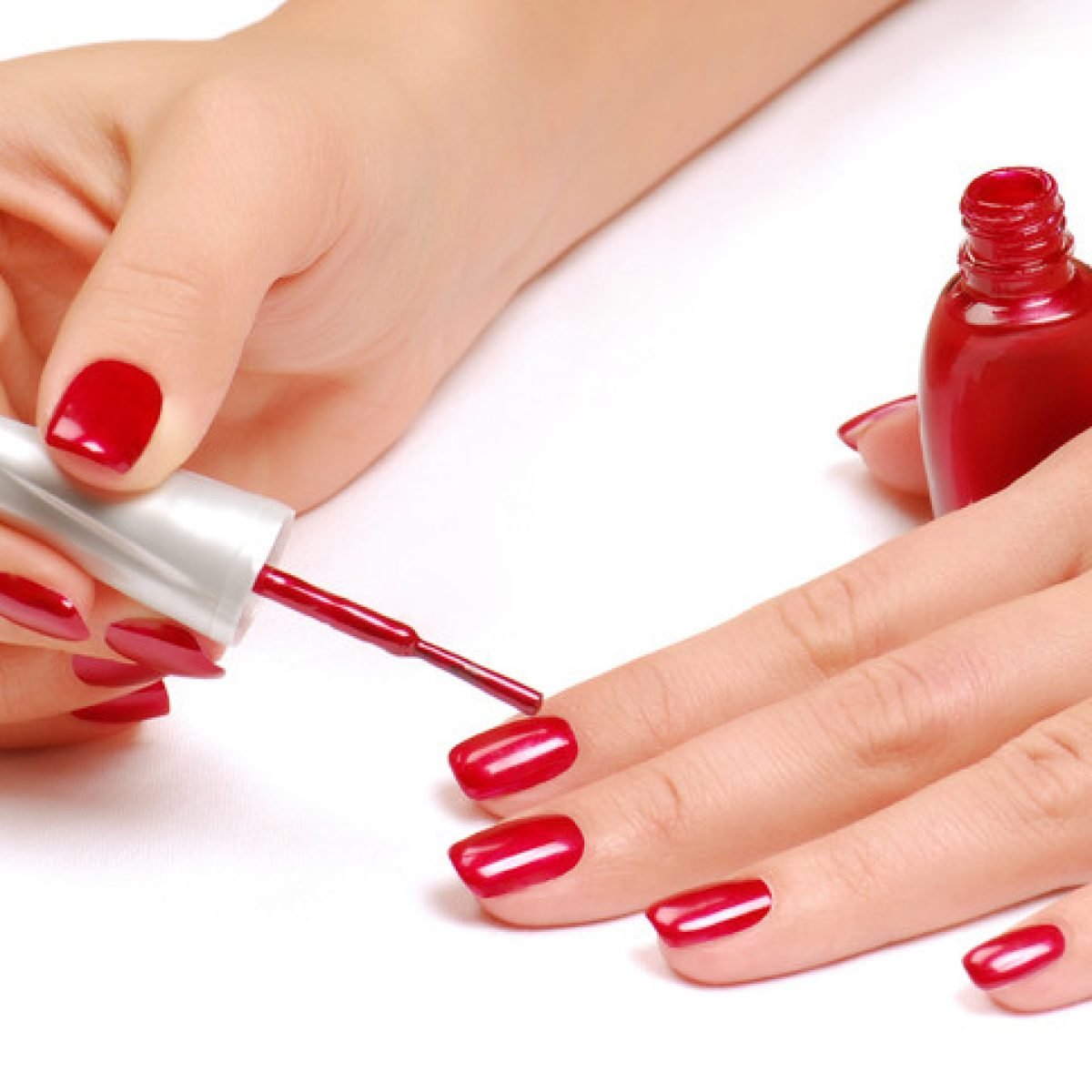 woman-applying-nail-polish